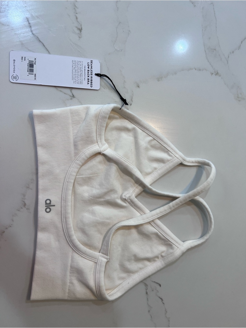 ALO Yoga Cream Ribbed Strappy Sports Bra - Picture 2 of 2